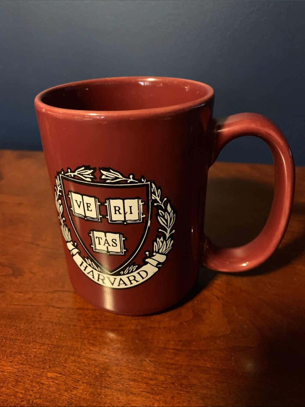 Maroon Ceramic Coffee Mug With Harvard University name and logo